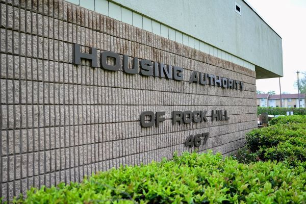 Exterior of the RHHA building with text that reads Housing Authority of Rock Hill 467.