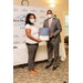 Kenyell Worthy accepting certificate from Dewayne Alford